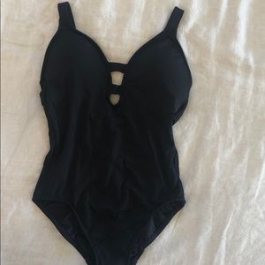 Black one piece with crisscross back.